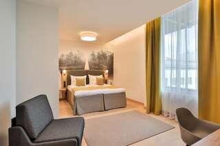 Отель Centennial Hotel Tallinn Таллин Улучшенный двухместный номер с 1 кроватью или 2 отдельными кроватями-1